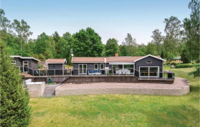 Four-Bedroom Holiday Home in Boxholm in Blåvik